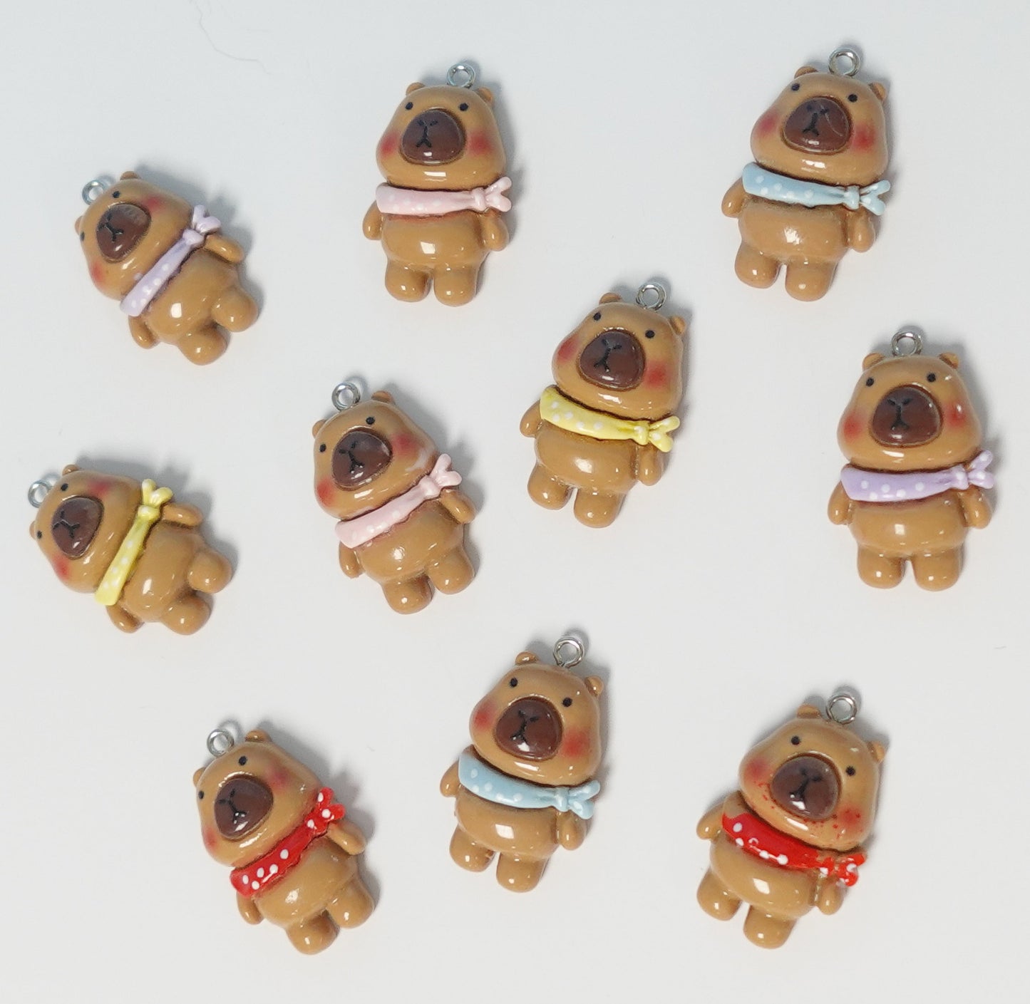 PAQUETE DE DIJES CAPIBARA
