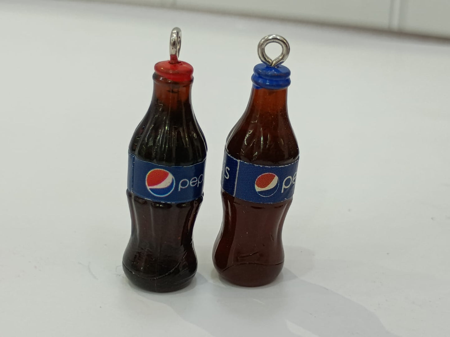 DIJE BOTELLA PEPSI
