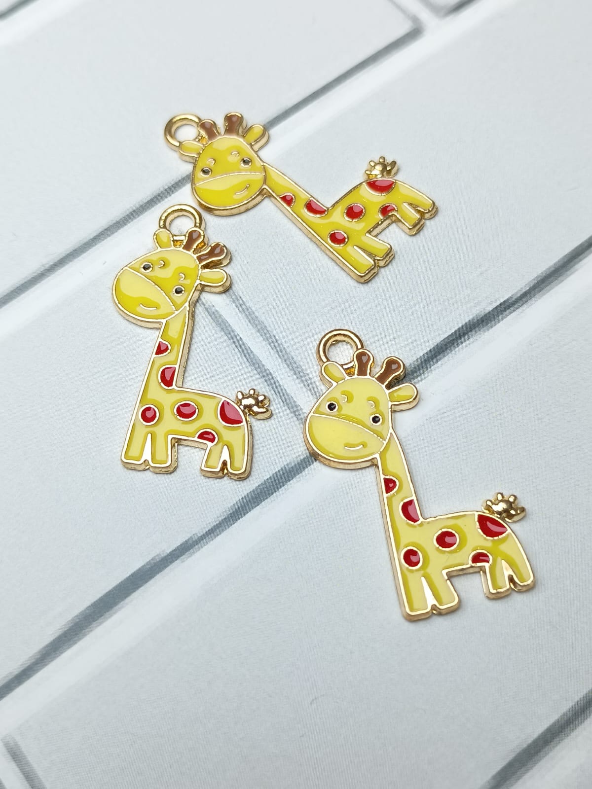 DIJE JIRAFA ESMALTADO