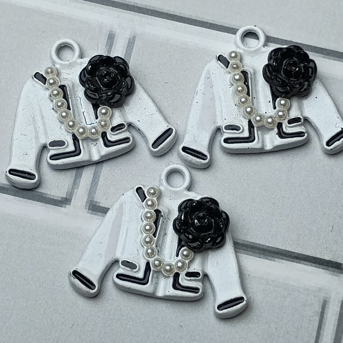 DIJE SACO CON FLOR Y COLLAR