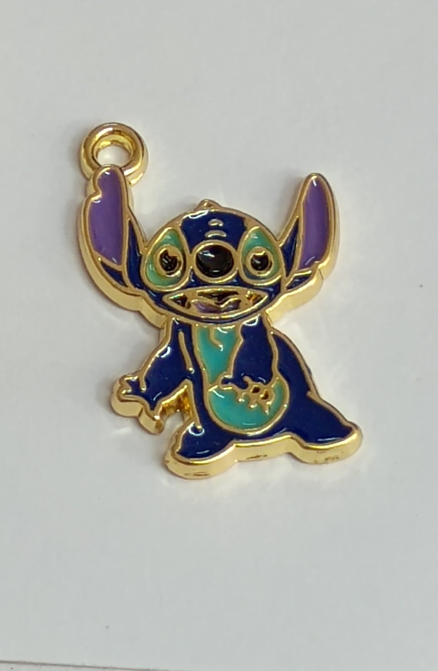 DIJE STITCH OREJITA MORADAS