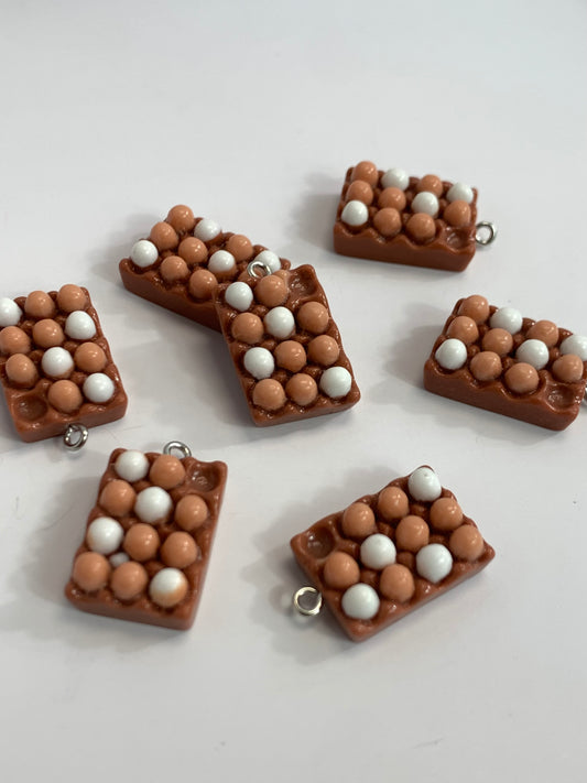 Dije Cartera de Huevos